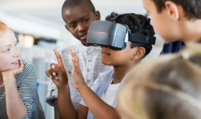 children are learning in VR headsets